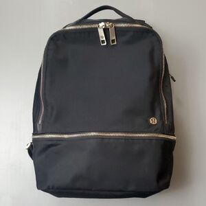 lululemon athletica Midnight Black Backpack W/Gold Zippers With Multiple Pockets